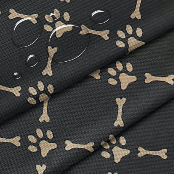 wasserdichter Oxford-Stoff - Hundepfötchen und Knochen auf schwarzem Hintergrund