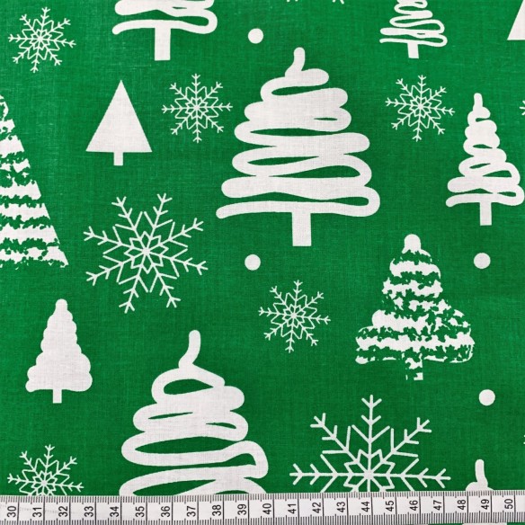 Baumwollstoff - weiße Weihnachtsbäume auf grünem Hintergrund