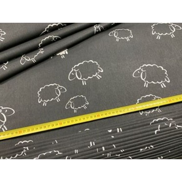 Baumwollstoff - Schafe auf schwarzem Hintergrund