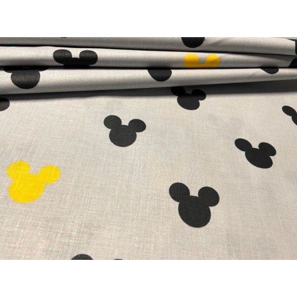 Baumwollstoff - Mickey Mouse, gelb-schwarz auf grauem