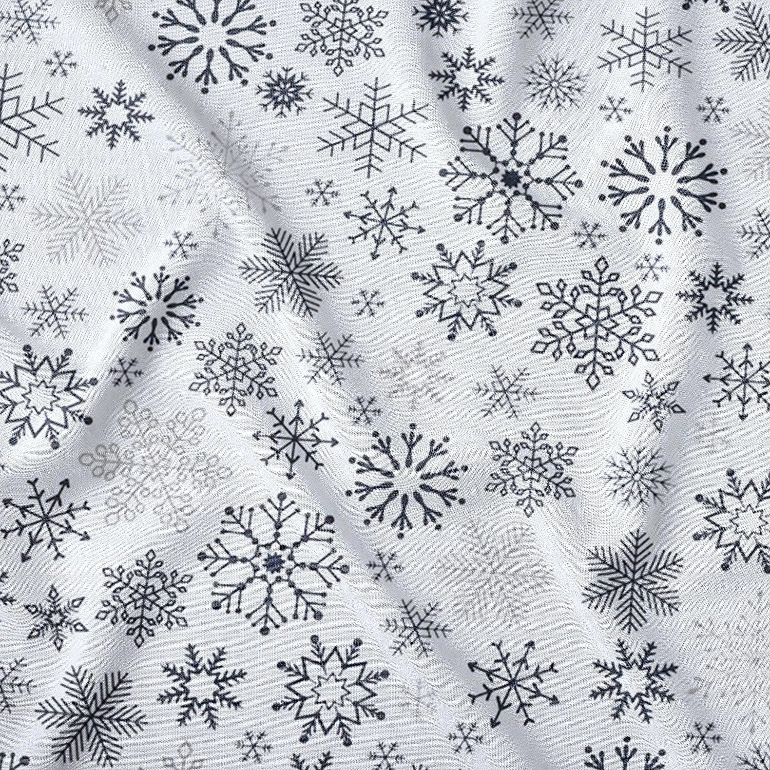 Baumwollstoff - Anthrazitfarbene Schneeflocken auf weißem Hintergrund